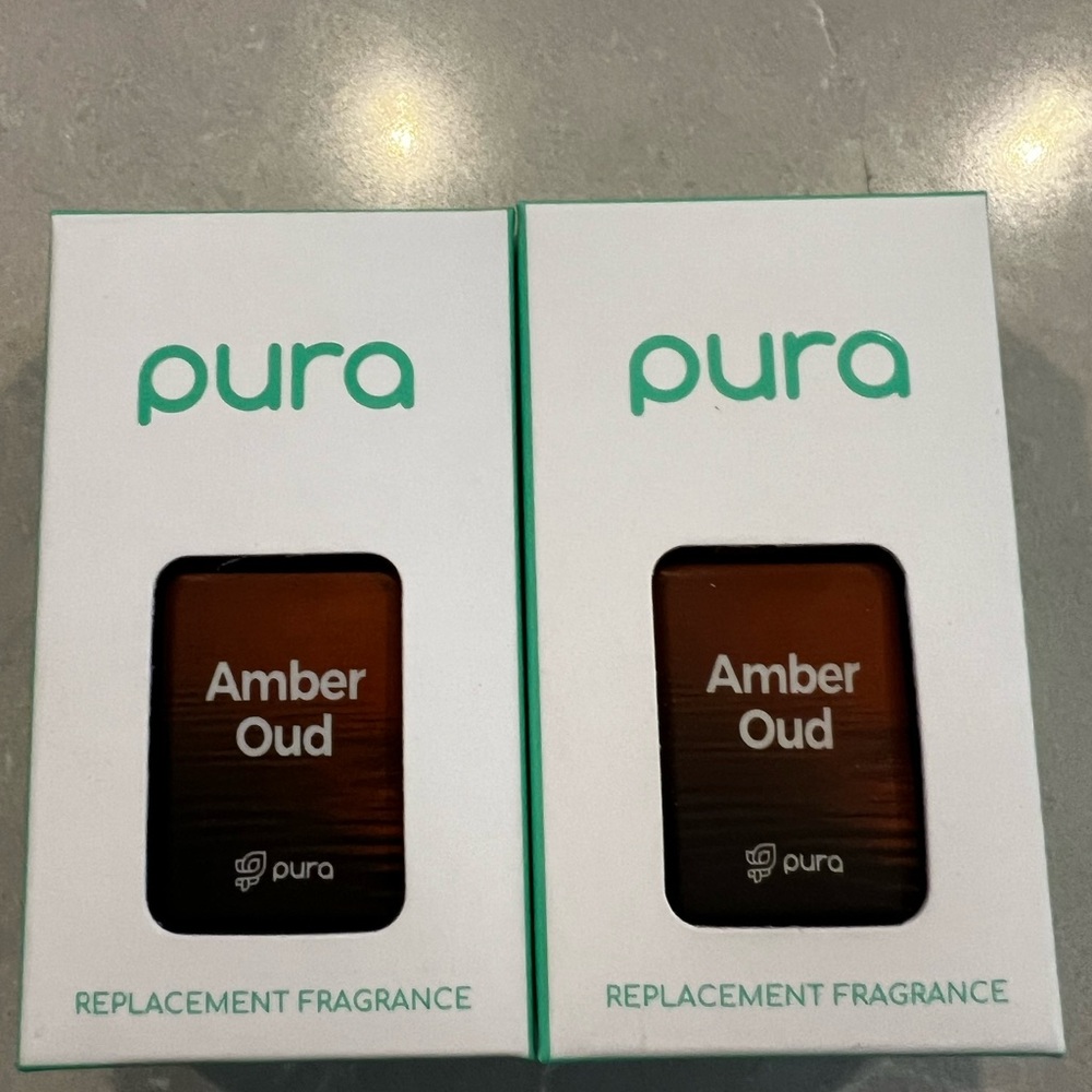 Two Pura Amber Oud diffuser scents